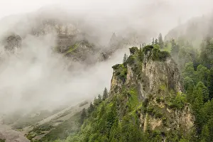 Wisps of mist cover the Karwendel mountains in the Grosser Ahornboden nature reserve