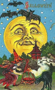 Witch dancing around a fire, black cat
