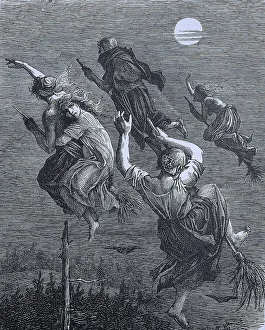 Witches riding a broom through the night