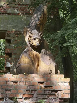 Wolf carved in wood in the ruins of the Wolf's Lair (also Wolfschanze)