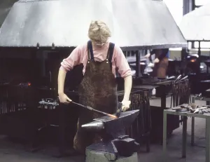 Wolfsburg. Girl in a man's job as an apprentice at VW ca