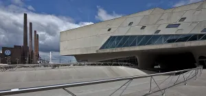 Wolfsburg Science Museum PHAENO western part from south 2001-05 by Zaha Hadid left VW power station