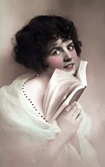 Woman with book, 1920s, handcoloured