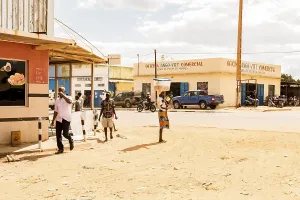 Woman carrying loads on her head