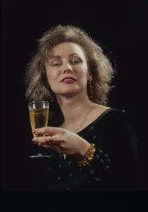 Woman with champagne glass in hand