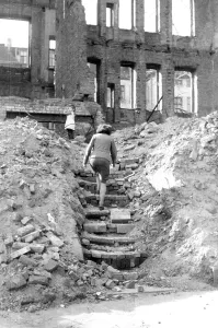 Woman and child in ruins, ca. 1945 Leipzig