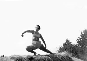 Woman doing outdoor gymnastics