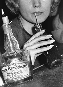 Woman drinking Coca Cola, 1950s, Germany, Europe