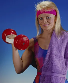 Woman with dumbbells