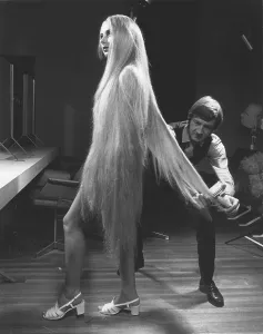 Woman with extremely long blonde hair