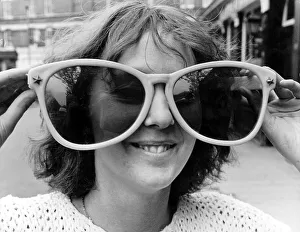 Woman with large glasses, England, Great Britain
