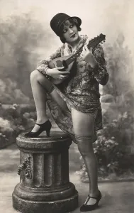 Woman playing plucking instrument
