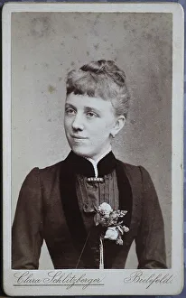 Woman, rural festive costume with floral decoration