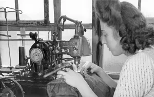 Woman sewing on a sewing machine
