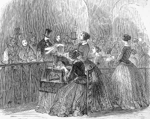 One woman sews on the sewing machine