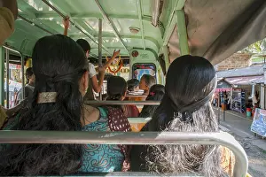 Woman sitting in bus, Palayoor