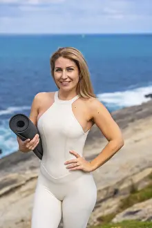 Woman smiling, looking at camera