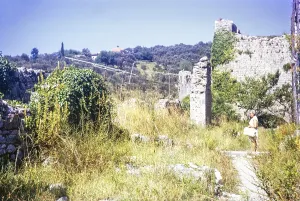 Woman tourist standing in ruins of Old Town, Stari Bar, Montenegro, former Yugoslavia, Europe 1970, Europe