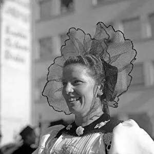 Woman in traditional traditional costume with hair ornaments
