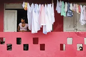 Woman next to washing on the line