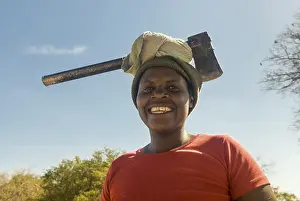 Woman wearing ax on her head, Thohoyandou
