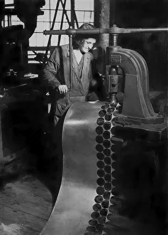 Woman at a workbench, historic photograph