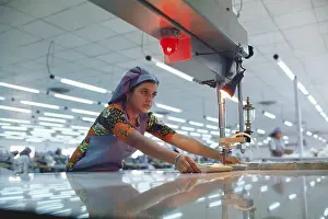 Woman working in factory, india