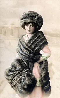 Woman wrapped in fur, historical photo, circa 1910