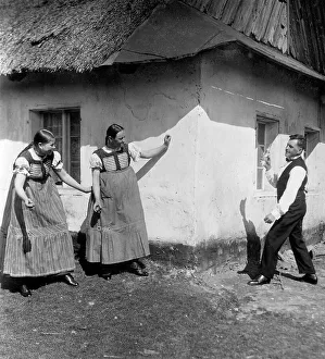 Two women an admirer ca. 1930, exact place unknown