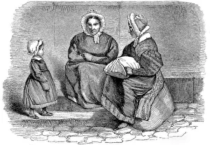 Two Women and a Child Sitting by the Road