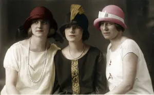 Three women with fashionble hats