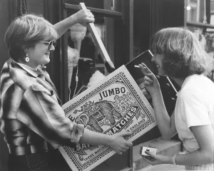 Two women with large matchbox, England