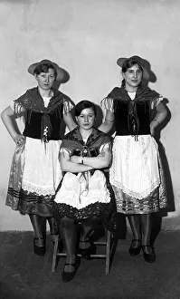 Three women in traditional traditional costume