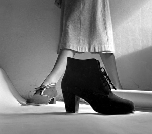 Women's fashion in the 1950s. A woman wearing the shoe fashion of year 1950