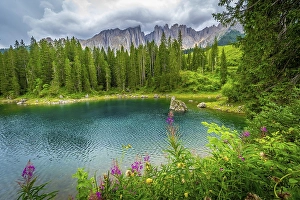 Wonderful turquoise lake surrounded by fir trees