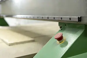 Wood milling device at work close up view in production plant