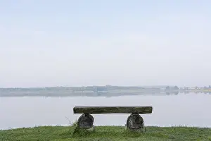 Wooden bench on the shore of the GroBer Varchentiner See