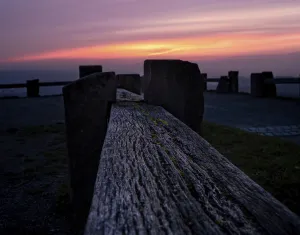 Wooden bench in the sunset on the Wallberg