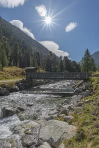 Wooden bridge over Zamser Bach in the valley Zamser Grund