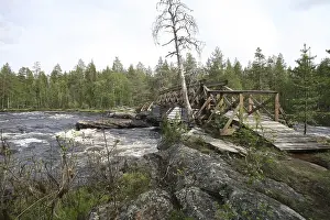 Wooden brigde over the Mudusjakk