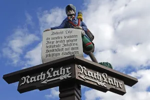 Wooden carved signpost to Lahr