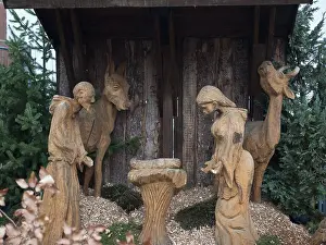 Wooden crib with religious figures and animals