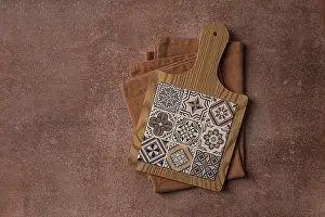 Wooden cutting board with ceramic tiles