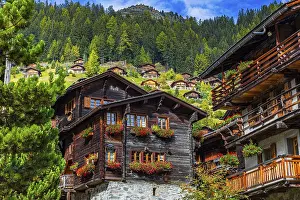 Wooden houses decorated with flowers in the historic village centre