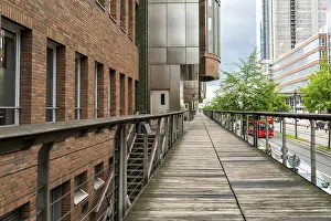 Framed Print : Wooden pedestrian walkway surrounded by modern and historic architecture in Hamburg Framed Print : Wooden pedestrian walkway surrounded by modern and historic architecture in Hamburg