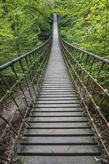 Wooden suspension bridge over a gorge