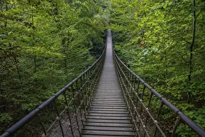 Wooden suspension bridge over a gorge