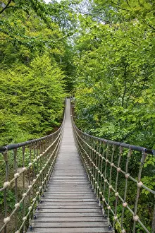 Wooden suspension bridge over a gorge