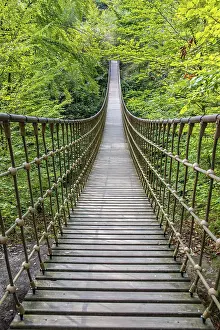 Wooden suspension bridge over a gorge