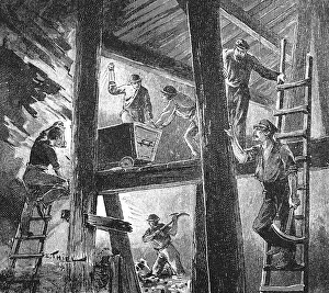 Work at work in a mine, supporting beams of the mine carpentry